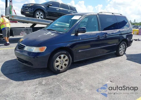 2003 Honda Odyssey Ex-L z USA, uszkodzony, nr VIN 5FNRL18933B097434